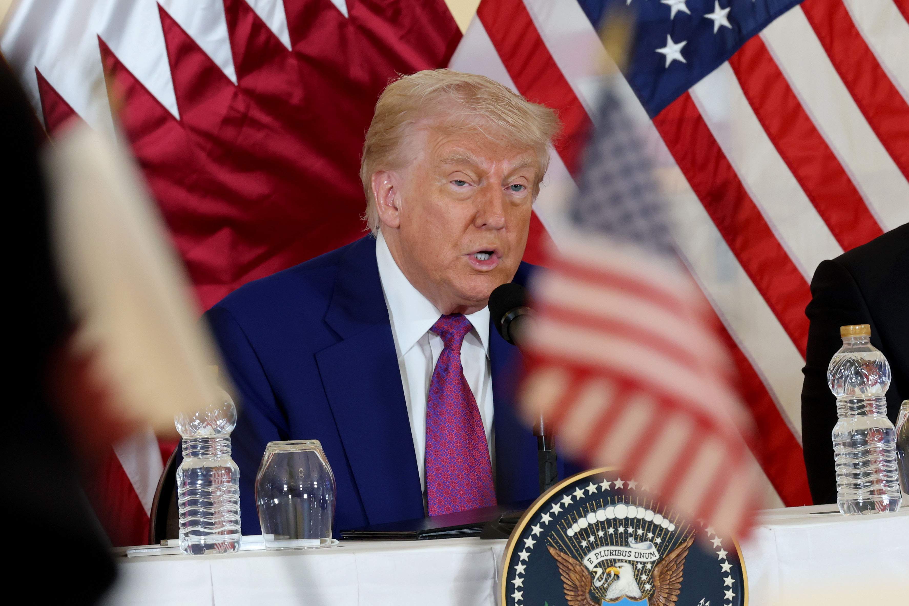 DOHA, QATAR – MAY 15: U.S. President Donald J. Trump meets with business leaders at the Ritz Carlton Hotel on May 15, 2025, in Doha, Qatar. Trump is on the third day of his visit to the Gulf to underscore the strategic partnership between the United States and Qatar, focusing on regional security and economic collaboration.